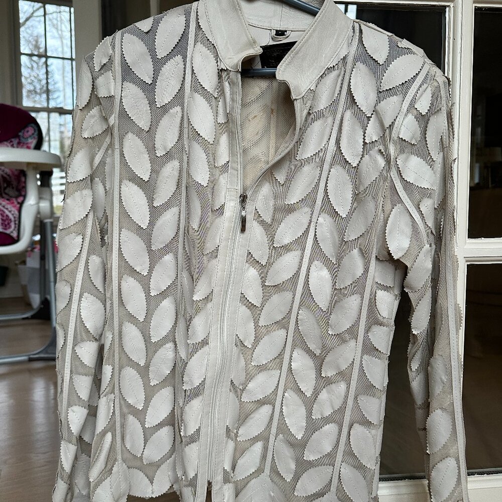 Unique mesh jacket with leather applique